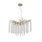 Crystal waterfall chandelier close-up showing gold frame and cascading strands