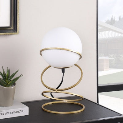 Glass globe lamp with LED bulb glowing in warm white