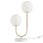 Globe table lamp in bedroom nightstand modern setting