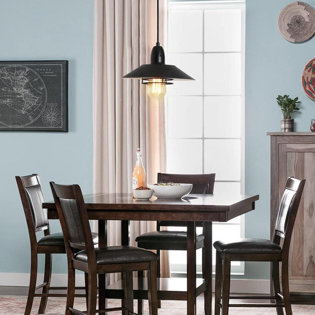 Vintage cage pendant light in dining room farmhouse setting