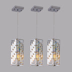 Crystal prism detail on chrome pendant light showing light refraction