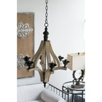 cream wood chandelier installed over kitchen dining table