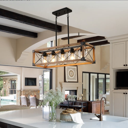 Industrial rectangle pendant light over kitchen island with walnut finish