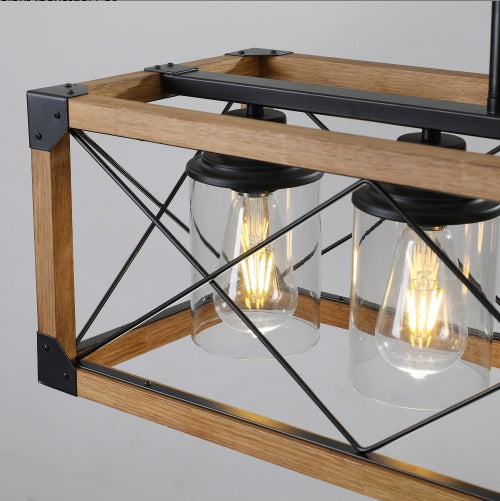 Walnut industrial pendant chandelier styled in cafe or restaurant decor setting