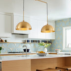 Two-light copper industrial pendant in living room ambient setting