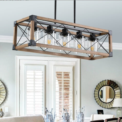 Close-up of black iron lampshade on walnut farmhouse chandelier