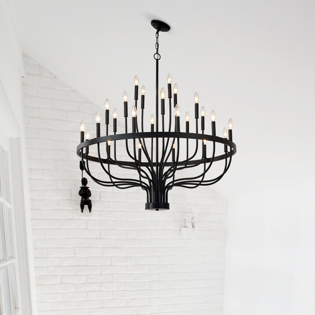black iron 24 candle chandelier installed in dining room