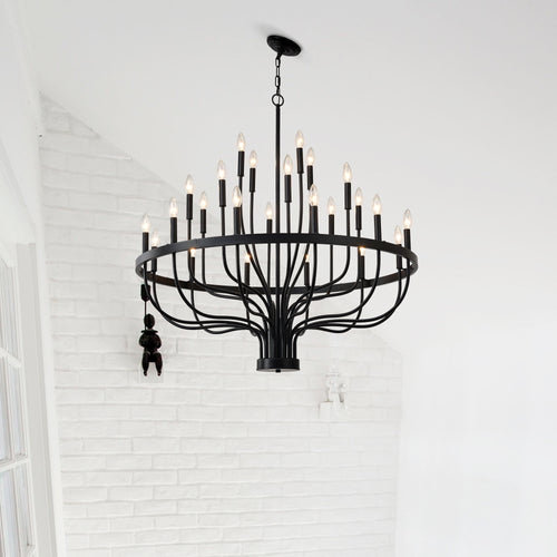 black iron 24 candle chandelier installed in dining room