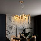 Gold crystal strand chandelier hanging in luxury dining room