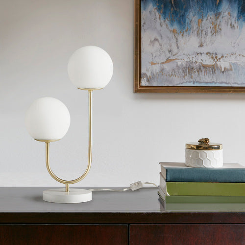 Dual globe lamp shade close-up showing light diffusion