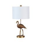 Matte gold flamingo table lamp as living room decorative accent