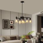 close-up of black metal frame and glass shades chandelier