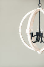 rustic 6-light wood chandelier over dining room table