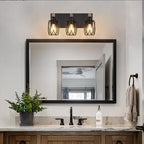 Farmhouse wall sconce installed above bathroom vanity mirror