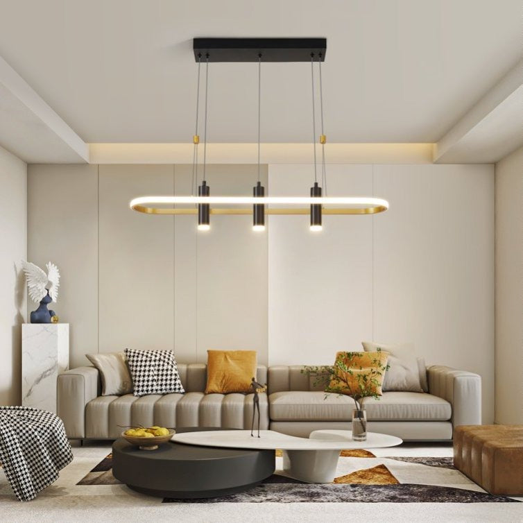 Modern living room with a gray sofa, coffee table, and pendant light fixture.