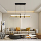 Modern living room with a gray sofa, coffee table, and pendant light fixture.