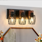 Industrial 3 light wall sconce with black cage and walnut wood